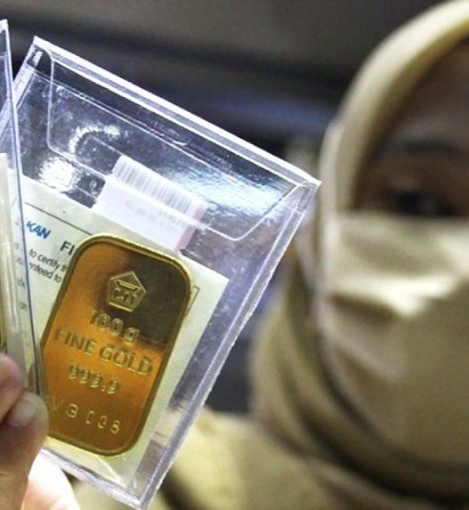 Harga emas naik turun