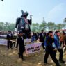 Dari tradisi hingga patung tikus berdasi