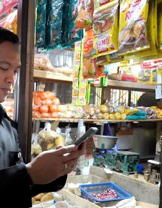 Pembayaran di pasar mulai nontunai